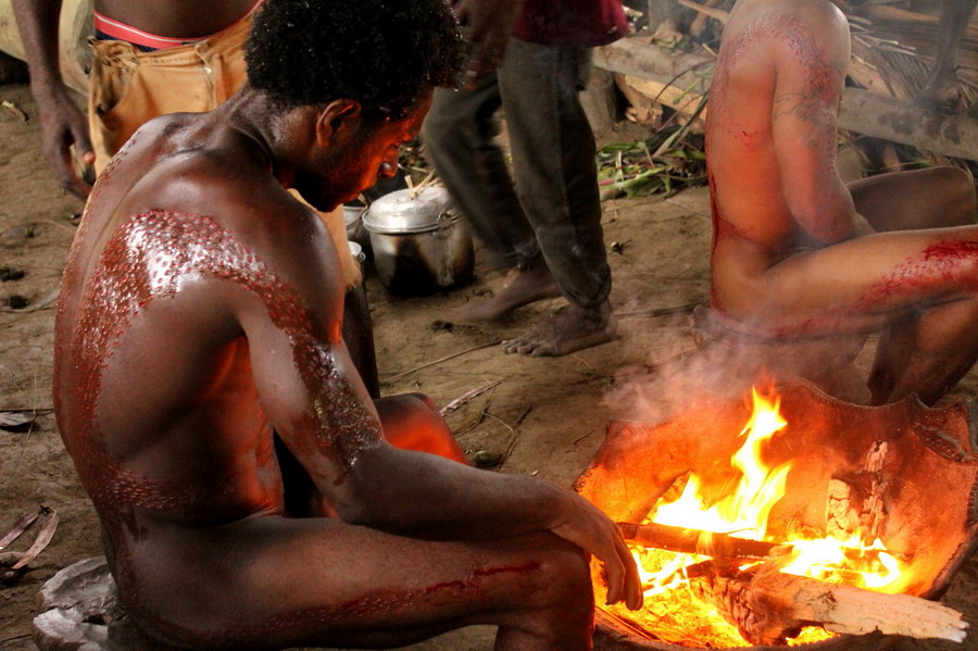 Papua New Guinea initiation ceremony fire