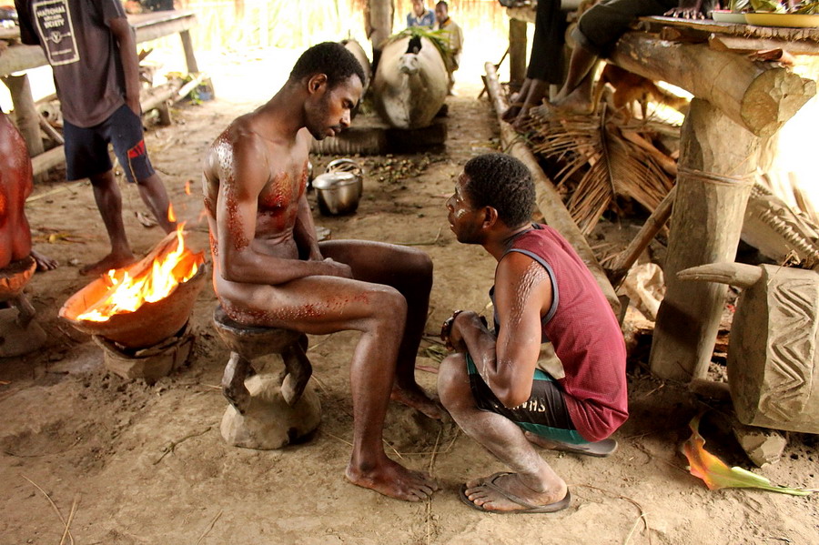 Papua New Guinea initiation ceremony friend
